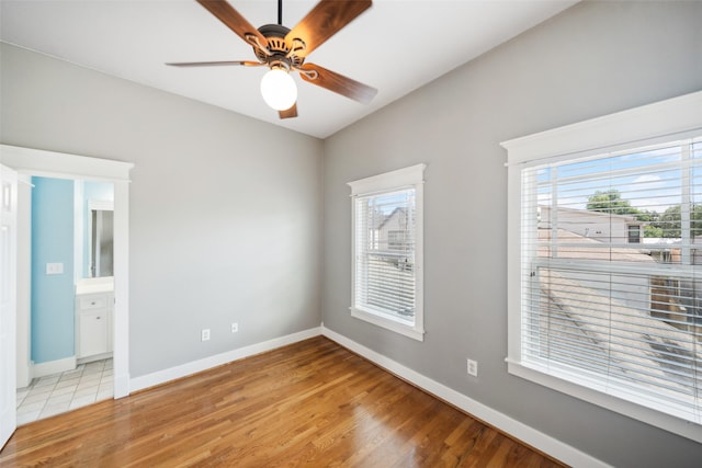 606 E 27th St, Houston, TX 77008 - spare room featuring light wood-style floors and a ceiling fan