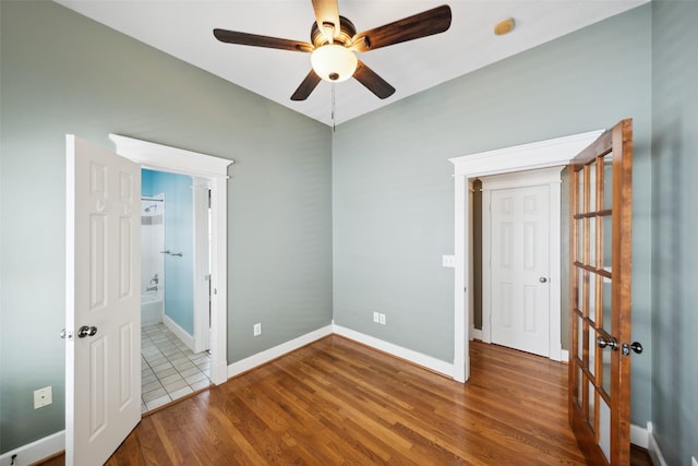 606 E 27th St, Houston, TX 77008 - unfurnished bedroom with wood finished floors and ceiling fan