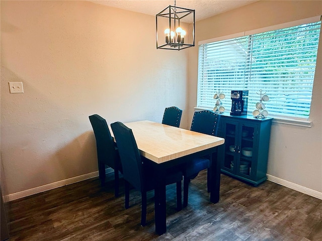 4822 Glendower Dr, Spring, TX 77373 - dining area with dark wood-type flooring and a chandelier