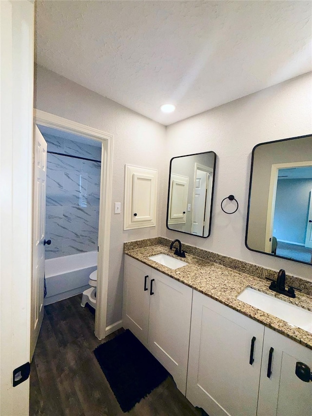 4822 Glendower Dr, Spring, TX 77373 - full bathroom with double vanity, wood finished floors, and recessed lighting