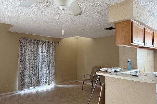3600 Jeanetta St Unit 1602, Houston, TX 77063 - office area featuring light tile patterned flooring, a textured ceiling, and a ceiling fan