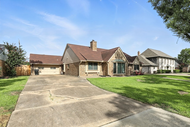2910 Riata Ln, Houston, TX 77043 - view of front of house with concrete driveway, brick siding, a chimney, and an attached garage
