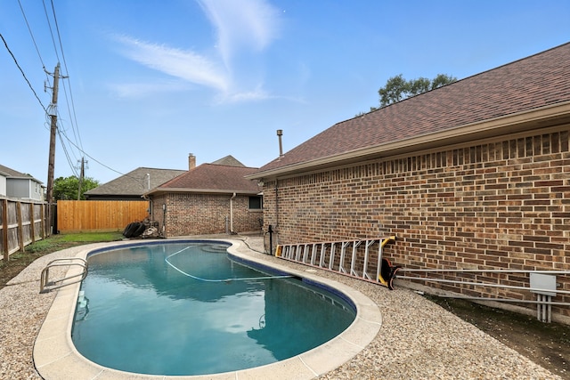 2910 Riata Ln, Houston, TX 77043 - view of swimming pool featuring a fenced backyard