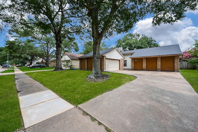 19923 Ricewood Way, Katy, TX 77449 - view of front of property with brick siding, a garage, and roof with shingles