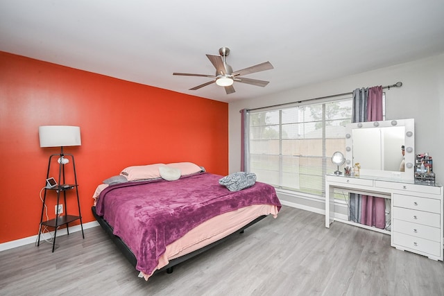 19923 Ricewood Way, Katy, TX 77449 - bedroom featuring wood finished floors and ceiling fan