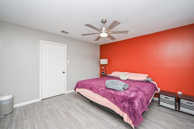 19923 Ricewood Way, Katy, TX 77449 - bedroom with wood finished floors and ceiling fan