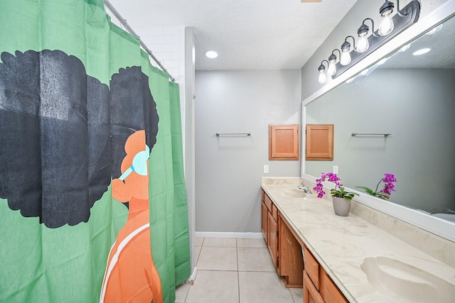 19923 Ricewood Way, Katy, TX 77449 - full bath featuring double vanity and tile patterned flooring