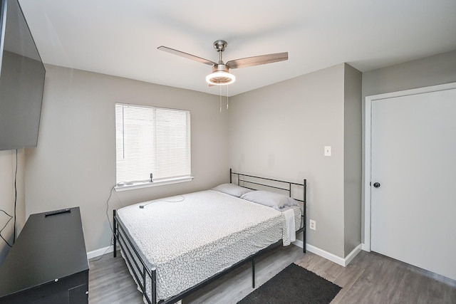 19923 Ricewood Way, Katy, TX 77449 - bedroom with wood finished floors and ceiling fan