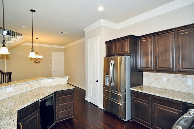 5325 Petty St Unit B, Houston, TX 77007 - kitchen featuring stainless steel fridge, dark wood finished floors, backsplash, dark brown cabinets, and light stone counters