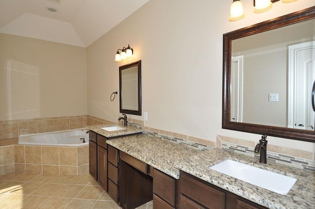 5325 Petty St Unit B, Houston, TX 77007 - full bathroom with a garden tub, double vanity, tile patterned floors, and vaulted ceiling