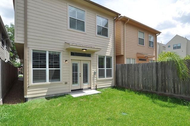 5325 Petty St Unit B, Houston, TX 77007 - rear view of house with french doors and a fenced backyard