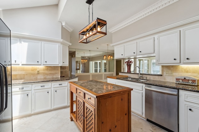 6606 Preston Trail Dr, Houston, TX 77069 - kitchen with dishwasher, a chandelier, ornamental molding, decorative backsplash, and white cabinetry