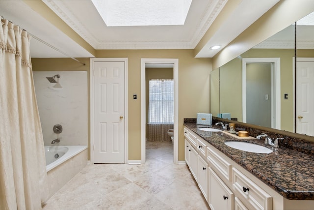 6606 Preston Trail Dr, Houston, TX 77069 - bathroom with double vanity, shower / bath combo, a skylight, crown molding, and tile patterned flooring
