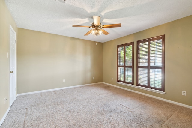 6606 Preston Trail Dr, Houston, TX 77069 - empty room featuring a ceiling fan, carpet flooring, and a textured ceiling