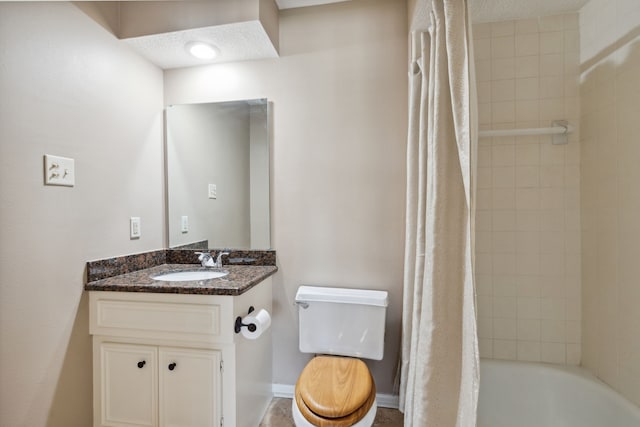 6606 Preston Trail Dr, Houston, TX 77069 - full bathroom featuring vanity, shower / bathtub combination with curtain, and a textured ceiling