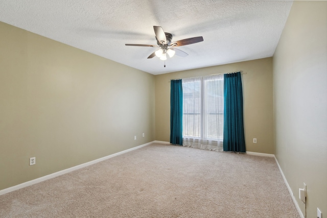 6606 Preston Trail Dr, Houston, TX 77069 - empty room with ceiling fan, light colored carpet, and a textured ceiling