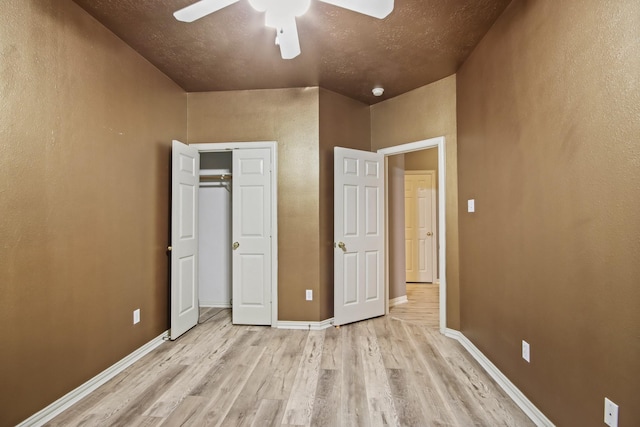 15919 Shadow Pass Trl, Tomball, TX 77377 - unfurnished bedroom with light wood-style flooring and a ceiling fan