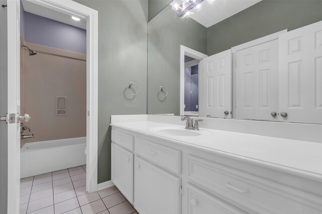 193 Grogans Point Rd, The Woodlands, TX 77380 - bathroom with vanity, tile patterned floors, and tub / shower combination