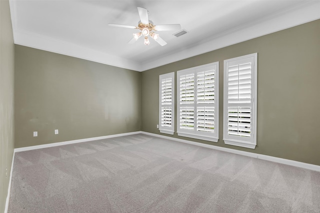 193 Grogans Point Rd, The Woodlands, TX 77380 - spare room featuring carpet, a ceiling fan, and crown molding