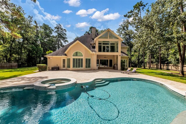 193 Grogans Point Rd, The Woodlands, TX 77380 - view of swimming pool with a patio, a fenced backyard, ceiling fan, and a pool with connected hot tub