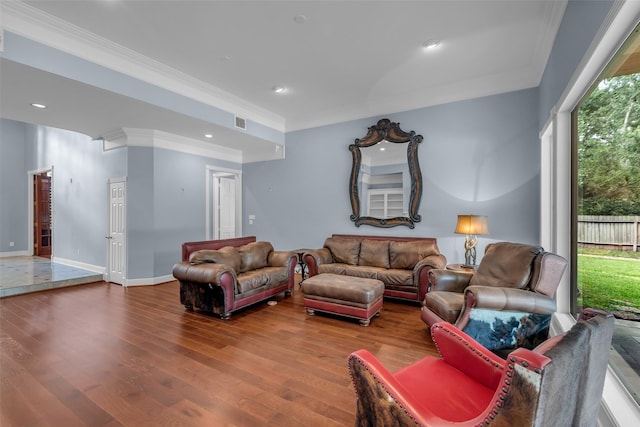 193 Grogans Point Rd, The Woodlands, TX 77380 - living area featuring wood-type flooring, ornamental molding, and recessed lighting