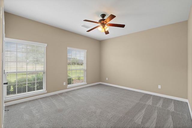10527 Caddo Lake Dr, Needville, TX 77461 - carpeted empty room featuring ceiling fan and baseboards