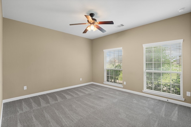 10527 Caddo Lake Dr, Needville, TX 77461 - empty room featuring a ceiling fan and carpet flooring