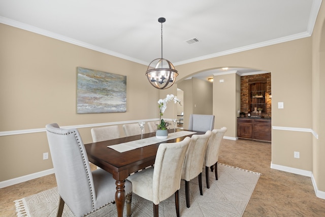 10527 Caddo Lake Dr, Needville, TX 77461 - dining room with arched walkways, a chandelier, and crown molding
