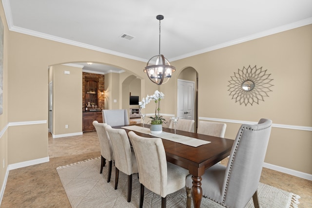 10527 Caddo Lake Dr, Needville, TX 77461 - dining space featuring arched walkways and crown molding