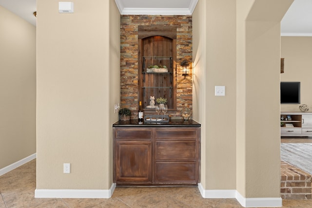 10527 Caddo Lake Dr, Needville, TX 77461 - indoor dry bar featuring ornamental molding and built in features