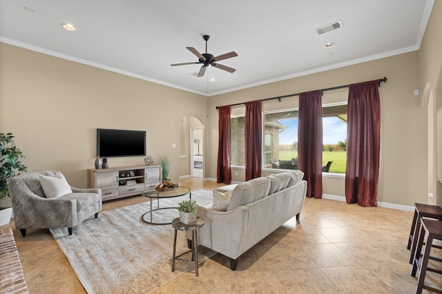 10527 Caddo Lake Dr, Needville, TX 77461 - living room featuring arched walkways, crown molding, ceiling fan, light tile patterned flooring, and recessed lighting