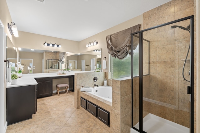 10527 Caddo Lake Dr, Needville, TX 77461 - bathroom featuring a bath, a shower stall, vanity, and tile patterned flooring