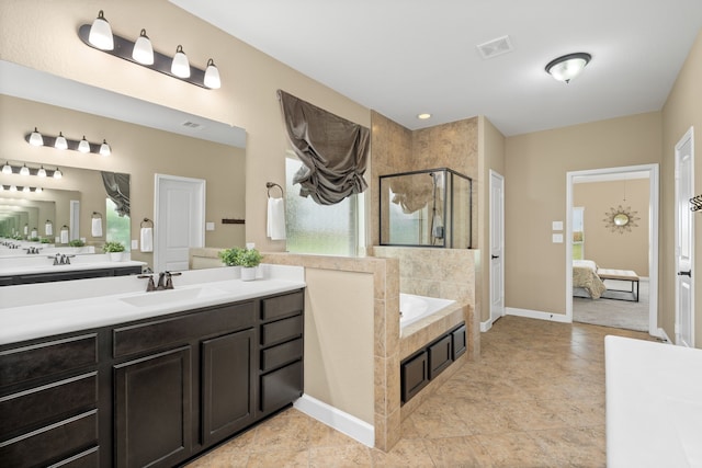 10527 Caddo Lake Dr, Needville, TX 77461 - bathroom with a shower stall, a bath, vanity, and connected bathroom