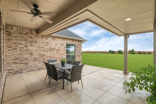 10527 Caddo Lake Dr, Needville, TX 77461 - view of patio / terrace with a ceiling fan and outdoor dining area