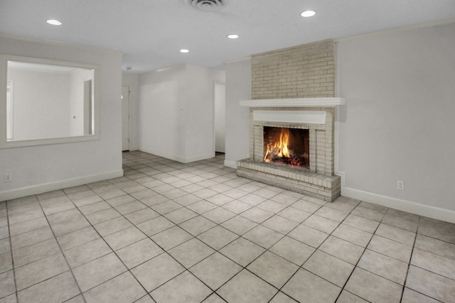 4047 Falkirk Ln, Houston, TX 77025 - unfurnished living room featuring recessed lighting, a brick fireplace, and light tile patterned flooring