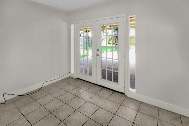 4047 Falkirk Ln, Houston, TX 77025 - unfurnished room with french doors, ornamental molding, and light tile patterned flooring