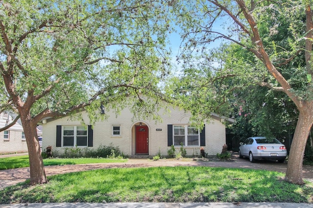 4047 Falkirk Ln, Houston, TX 77025 - view of front of house featuring brick siding and a front yard