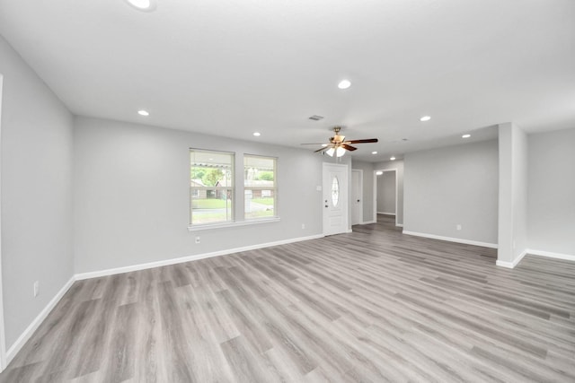 5634 Beldart St, Houston, TX 77033 - unfurnished living room with recessed lighting, light wood-type flooring, and a ceiling fan