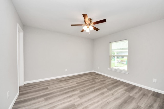 5634 Beldart St, Houston, TX 77033 - empty room with wood finished floors and ceiling fan