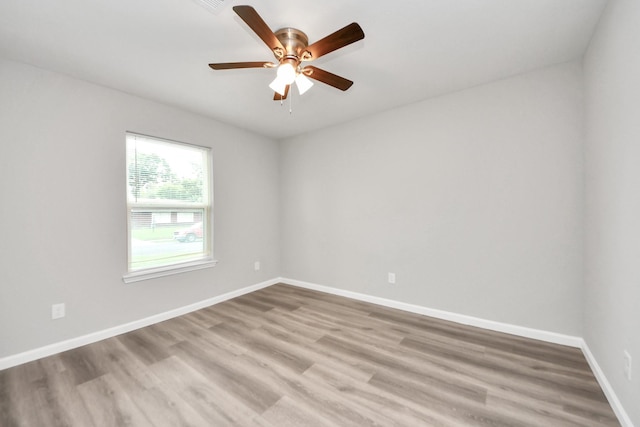 5634 Beldart St, Houston, TX 77033 - spare room with ceiling fan and wood finished floors