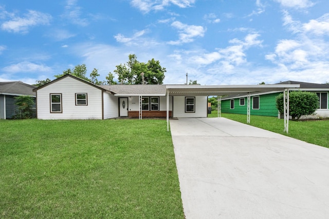 5634 Beldart St, Houston, TX 77033 - single story home featuring concrete driveway, a front lawn, and an attached carport