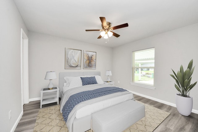 5634 Beldart St, Houston, TX 77033 - bedroom with wood finished floors and a ceiling fan