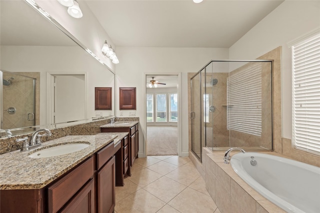 4403 Lodge Vine Ct, Sugar Land, TX 77479 - bathroom featuring double vanity, a stall shower, a garden tub, tile patterned flooring, and a ceiling fan