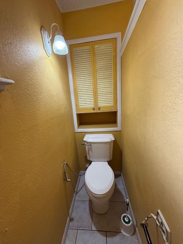 427 22nd Ave N, Texas City, TX 77590 - bathroom featuring tile patterned floors and toilet