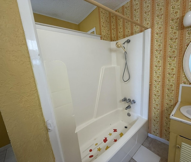 427 22nd Ave N, Texas City, TX 77590 - bathroom with vanity, tile patterned flooring, shower / tub combination, a textured ceiling, and wallpapered walls