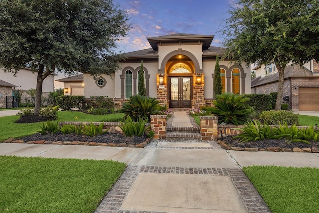 17310 Venado Dr, Cypress, TX 77433 - mediterranean / spanish home with french doors, stucco siding, and a front yard