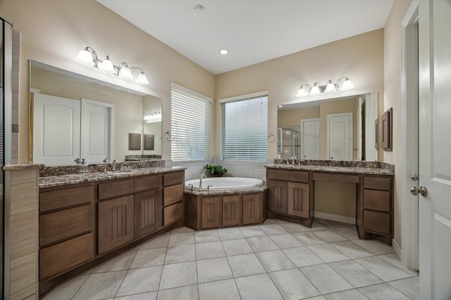 17310 Venado Dr, Cypress, TX 77433 - full bath featuring a stall shower, two vanities, a bath, and tile patterned flooring