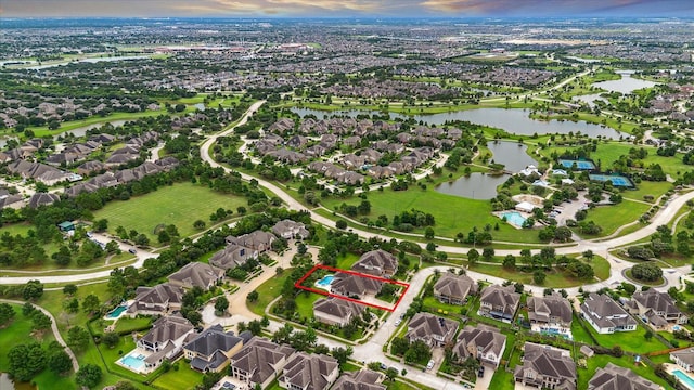 17310 Venado Dr, Cypress, TX 77433 - aerial view of property and surrounding area featuring property parcel outlined, a large body of water, and nearby suburban area