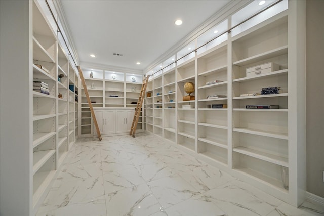 17310 Venado Dr, Cypress, TX 77433 - walk in closet featuring marble finish flooring