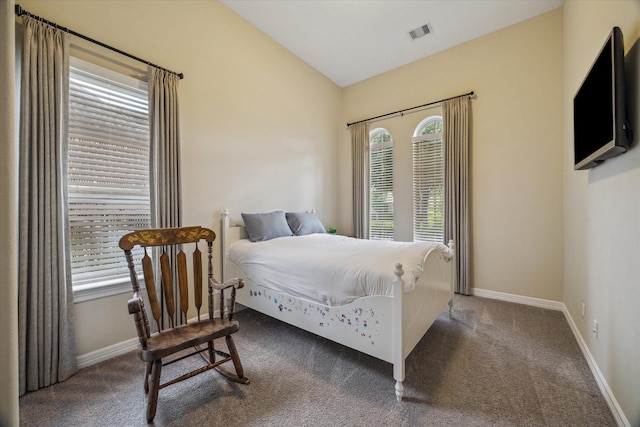 17310 Venado Dr, Cypress, TX 77433 - carpeted bedroom with vaulted ceiling and baseboards